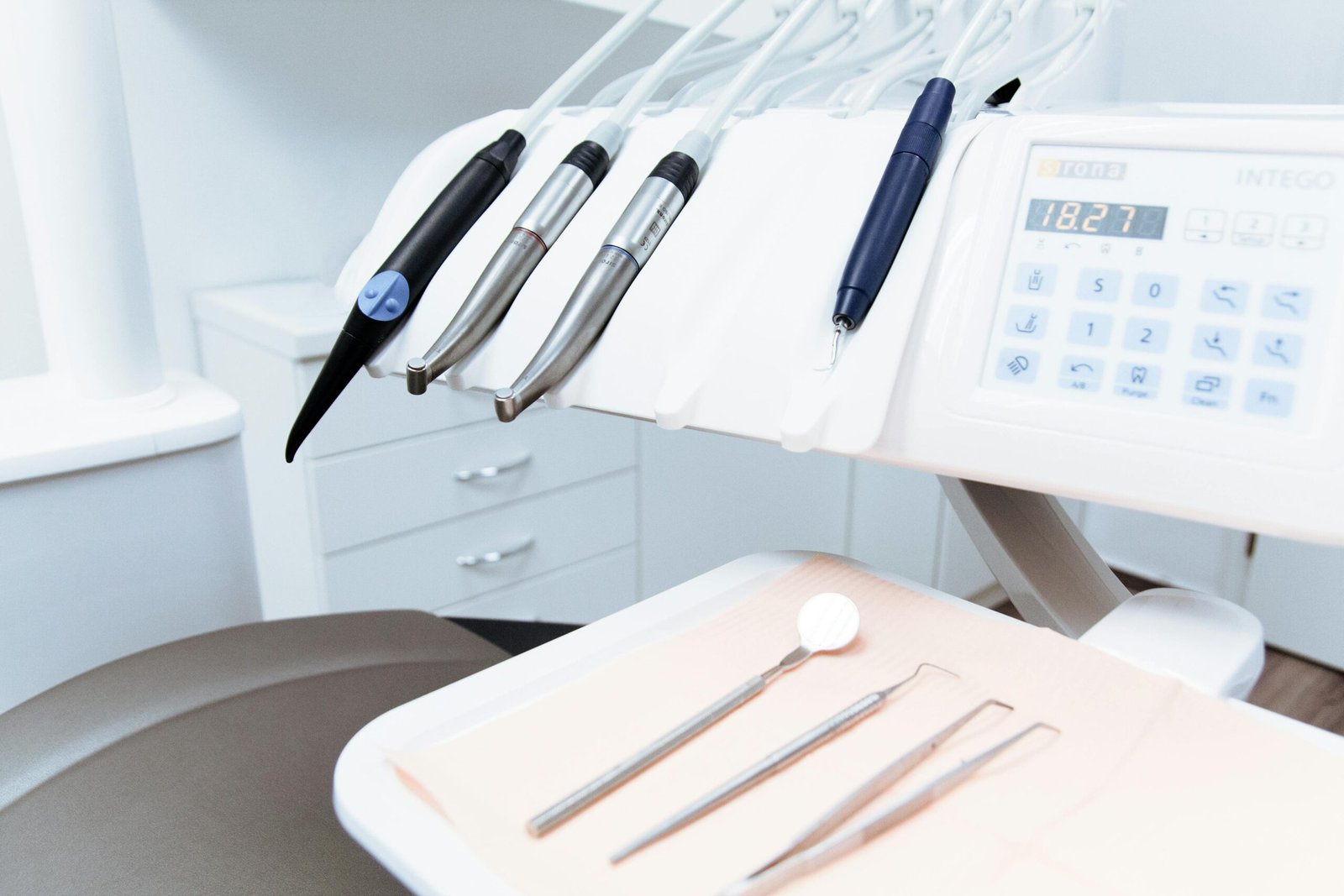 Clean and professional dental office setup with tools ready for patient treatment.